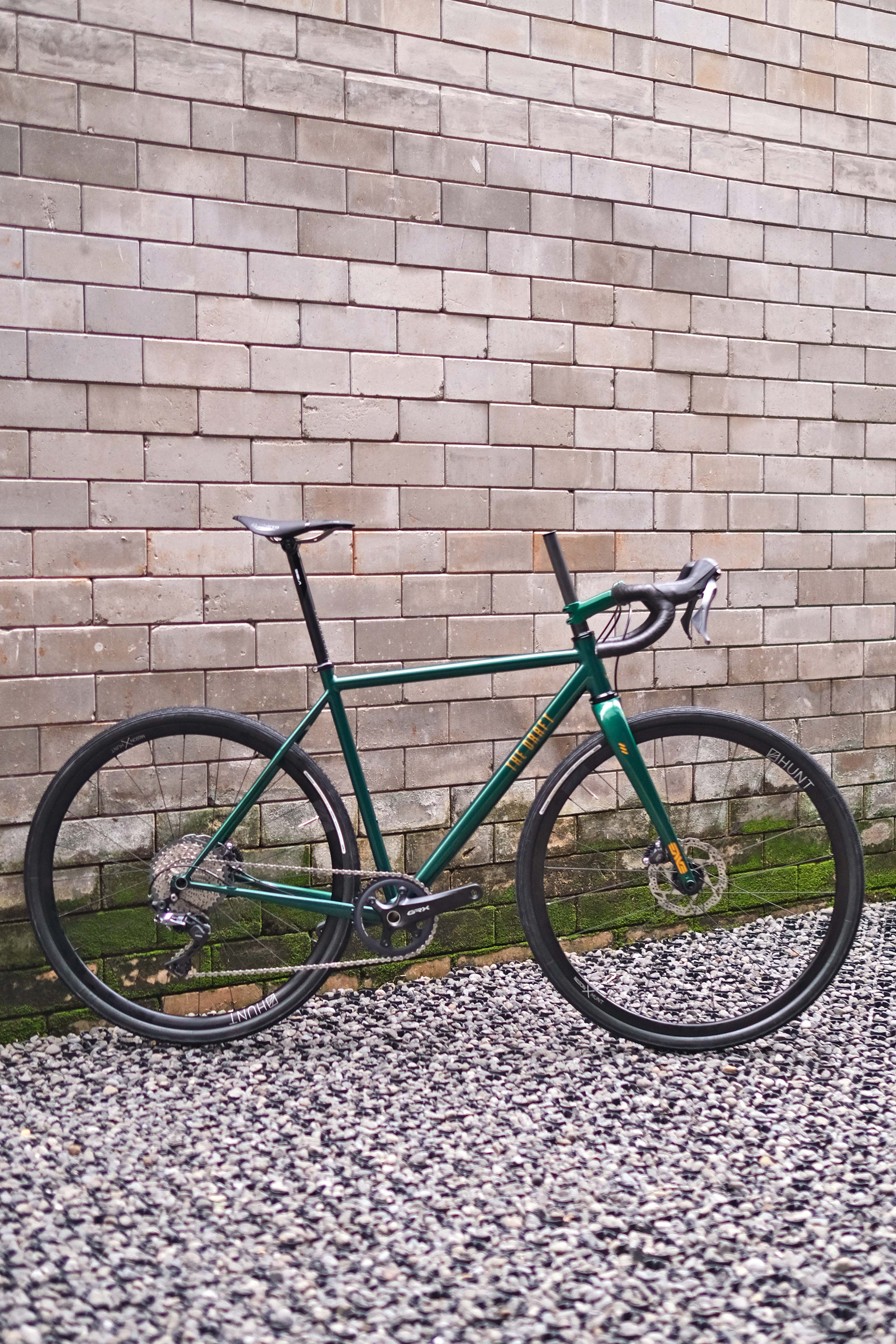 green gravel bike The Draft Comet Eater Gravel Bike