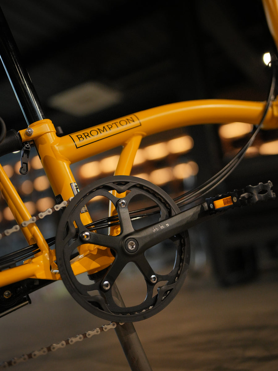 Brompton C Line Explore | Mid Rise | With Rear Rack - Bumblebee Yellow