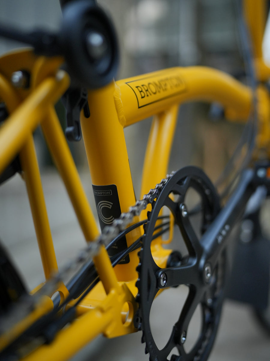 Brompton Yellow Rack Brompton C Line Explore Low Rise with Rear Rack - Yellow – SpinWarriors